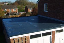 Laying a new felt roof on a garage