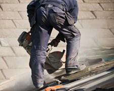 Replacing broken roof tiles